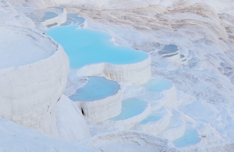 Pamukkale Cotton Castle: Stunning white terraces, thermal springs.