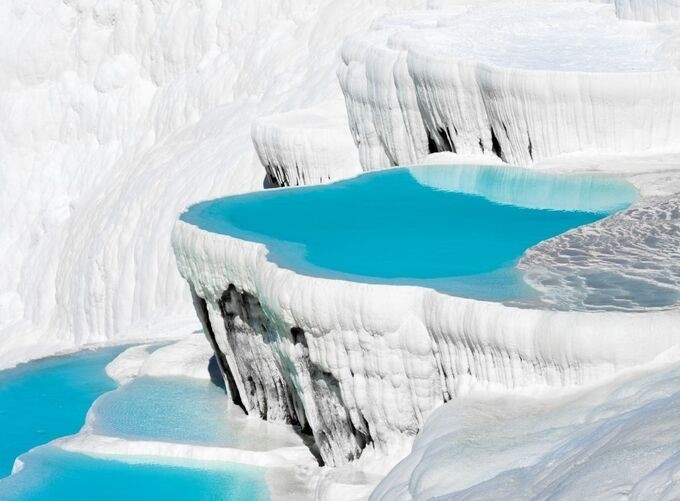 Pamukkale’s terraces offer stunning views of nature and mineral-rich waters