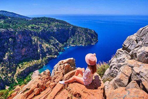 The picturesque coastline of Fethiye with clear blue waters and mountains