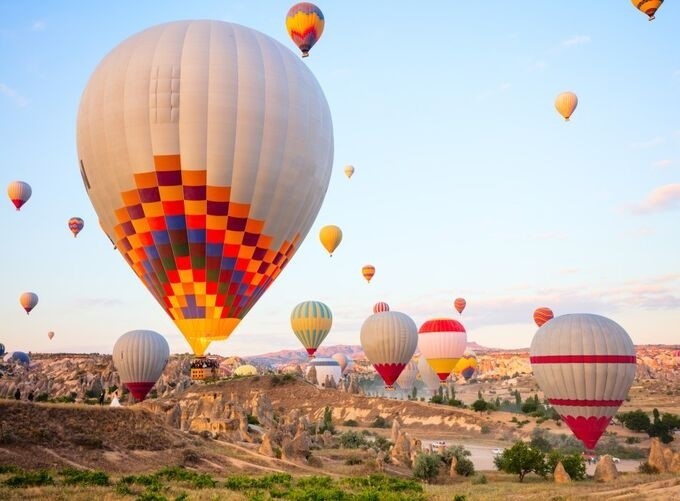 Float above Cappadocia’s fairy chimneys for panoramic sky-high views