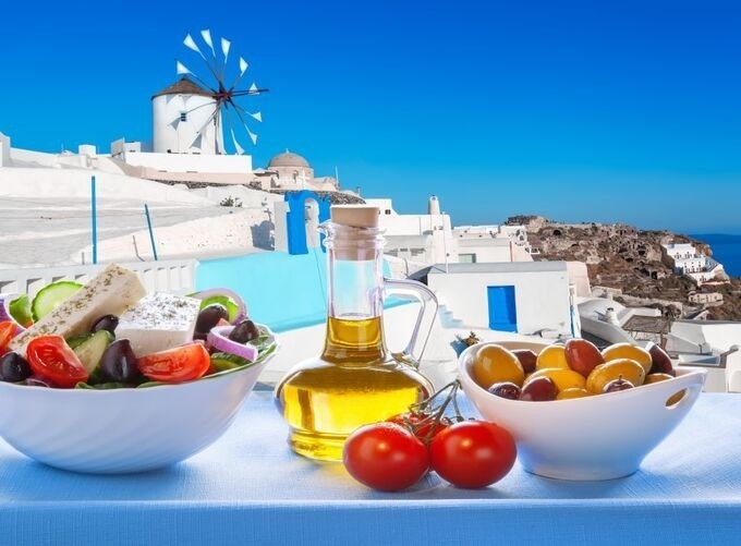 Santorini’s timeless beauty reflected in its tranquil blue waters