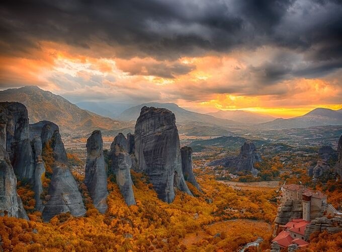 Golden hour light glowing over Meteora’s breathtaking rocky landscapes