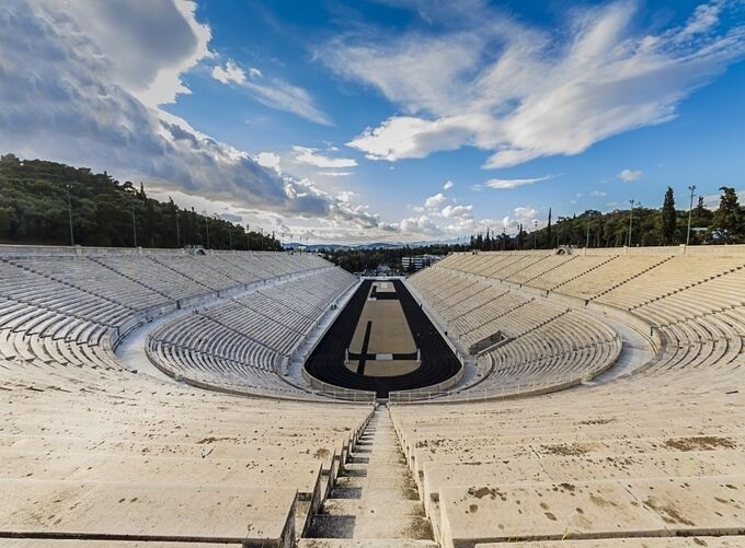 Panoramic view of Olympia archaeological site with ancient stone columns