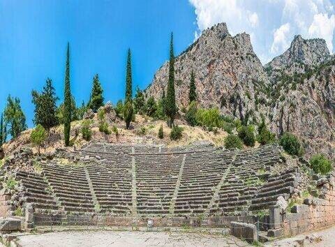 Temple of Apollo at Delphi surrounded by breathtaking valley scenery