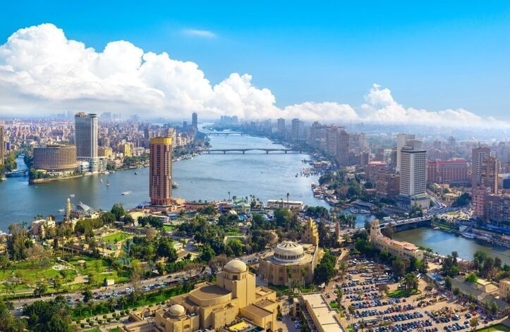 Aerial view of bustling Cairo city with Nile River flowing through