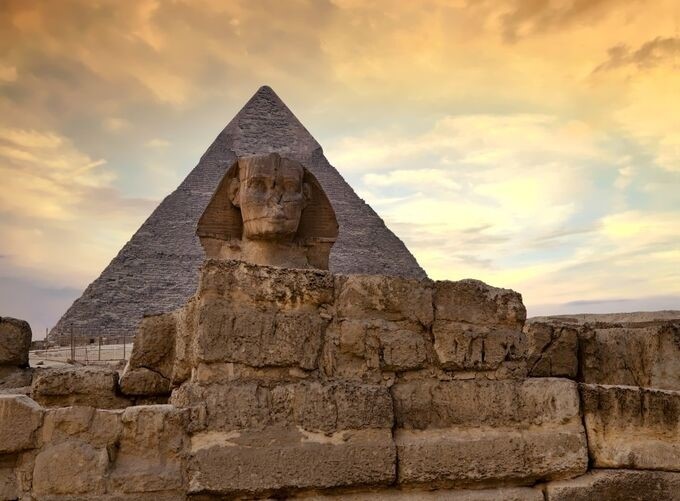 The Pyramids of Giza rising majestically amidst Egypt’s golden sands