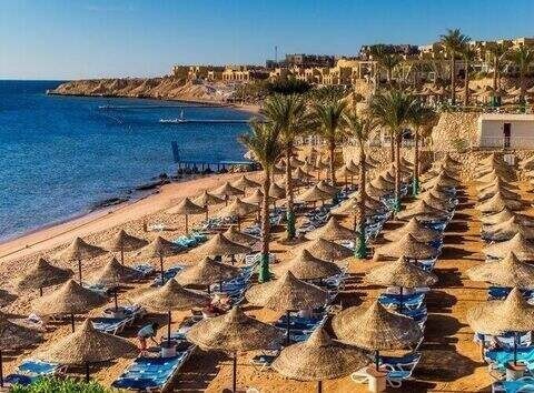 Golden hour light reflecting on Sharm El Sheikh’s pristine beaches