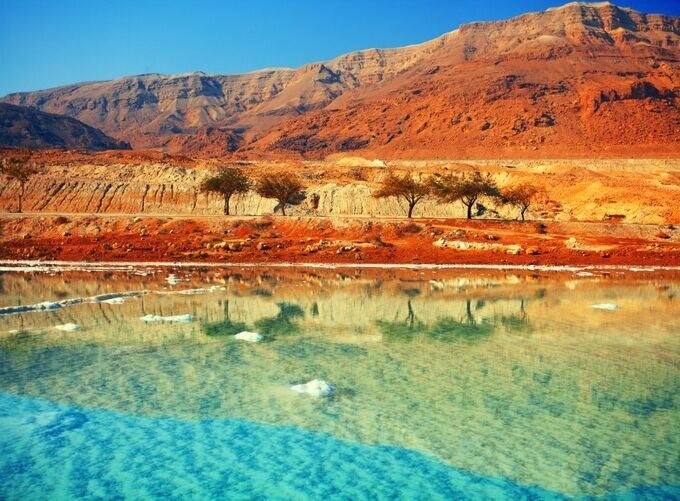 Crystal-clear waters of Dead Sea glistening under the bright sun