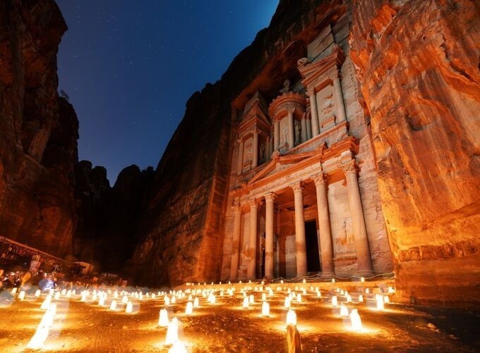 •  Petra’s Treasury facade beautifully framed by the dramatic Siq canyon