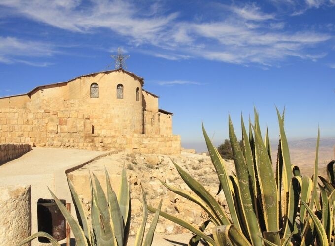 Mount Nebo's mosaics depicting biblical scenes in vibrant colors