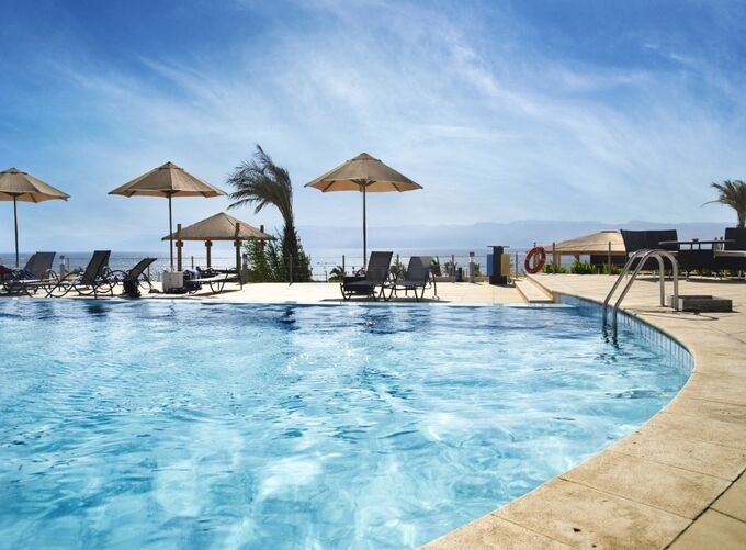 Aqaba’s palm-lined promenade overlooking the tranquil Red Sea waters