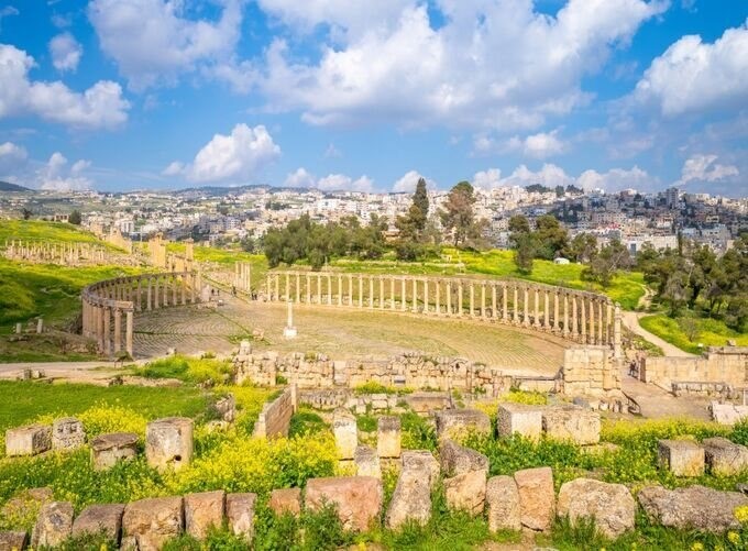 Tourists exploring Jerash’s ancient ruins and Roman archaeological wonders