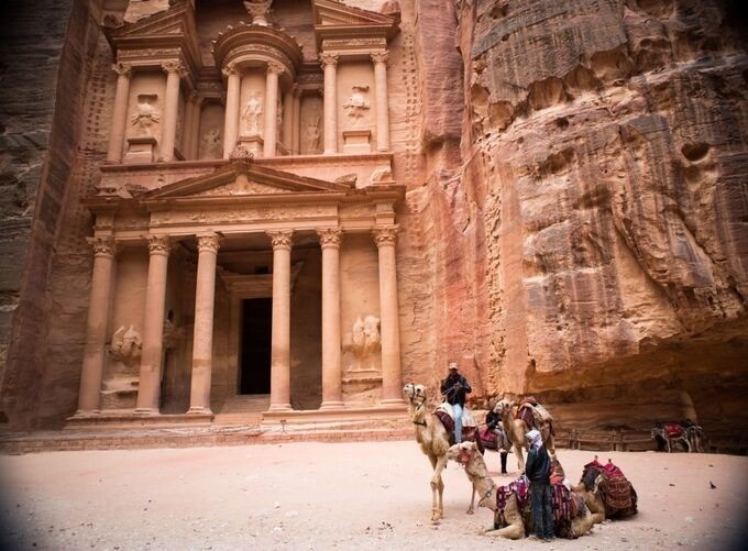 Visitors discovering Petra’s wonders surrounded by timeless desert scenery