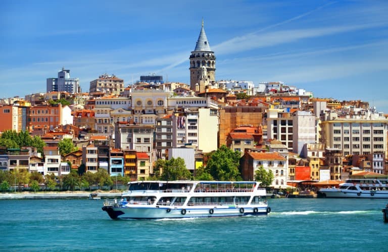 Galata Tower overlooks Istanbul's colorful skyline and the Bosphorus, offering one of the city's most iconic panoramic views.